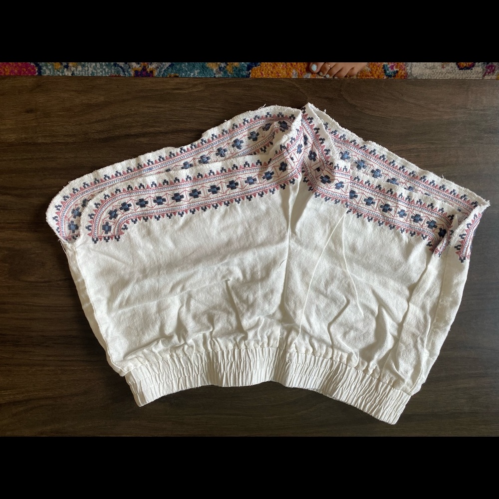 Cloth shorts with Aztec pattern.